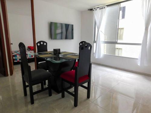 TV a/nebo společenská místnost v ubytování Hermoso apto completo en Montenegro Quindío
