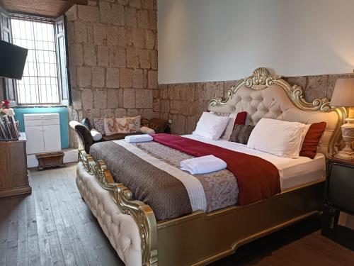 Hotel Vintage "Rialto"にあるベッド