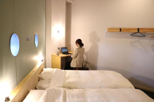 Postel nebo postele na pokoji v ubytování Hostel Tomar