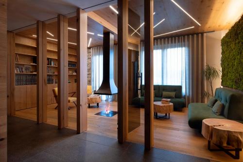 a living room with a couch and a table at Sport Village Hotel & Spa in Castel di Sangro