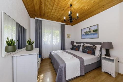 Postel nebo postele na pokoji v ubytování Barba in Trogir - Mittel-Dalmatien
