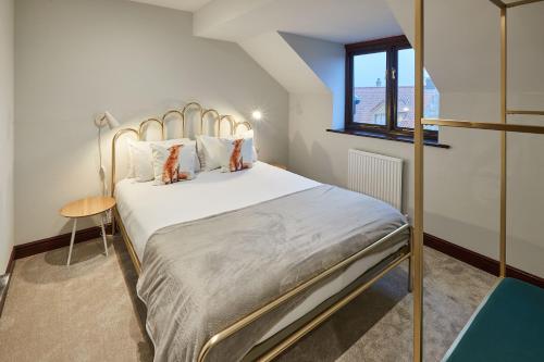 a bedroom with a bed and a window at Host & Stay - The Fox in Scarborough