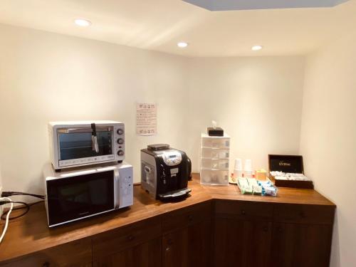 Una cocina o cocineta en 沐品居 無櫃檯自助旅店