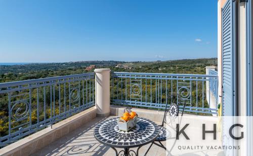 Balkoni atau teres di Villa Xenia in Karavados village, private Pool, Barbecue, Top view!