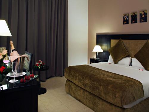 Posteľ alebo postele v izbe v ubytovaní Rawabi Hotel Marrakech & Spa