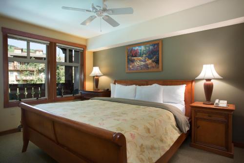 a bedroom with a bed and a ceiling fan at 2211 - Two Bedroom Standard Eagle Springs East condo in Solitude