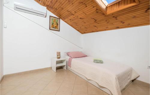 Postel nebo postele na pokoji v ubytování 2 Bedroom Gorgeous Home In Susak