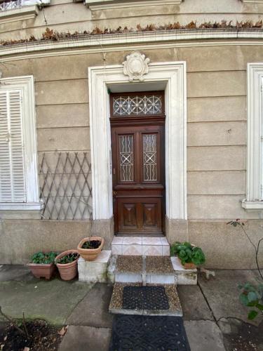 a door of a house with potted plants in front of it at L'encre - T2 4 Personnes - Port 2' Plage10' in La Seyne-sur-Mer