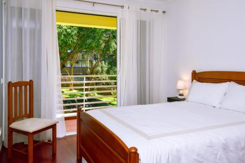 Llit o llits en una habitació de Lido Gardens Funchal