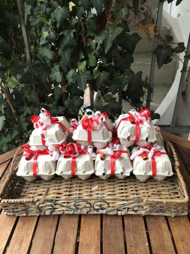 a group of wrapped presents on a wicker table at Agriturismo San Michele in San Michele