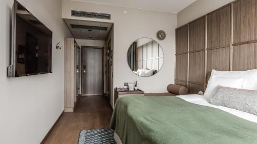 Postel nebo postele na pokoji v ubytování Clarion Hotel Umeå