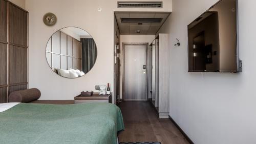 Postel nebo postele na pokoji v ubytování Clarion Hotel Umeå