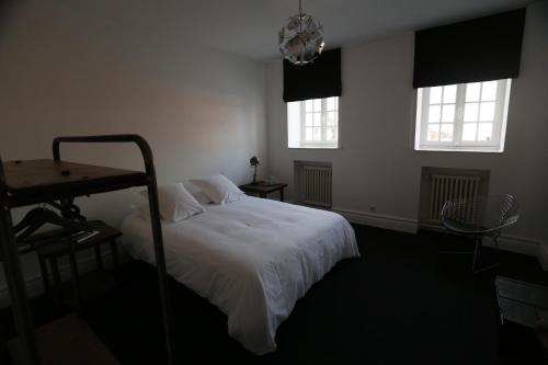Postel nebo postele na pokoji v ubytování B&B Le Cercle De Malines