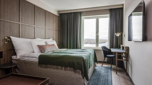 Postel nebo postele na pokoji v ubytování Clarion Hotel Umeå