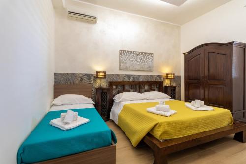 Posteľ alebo postele v izbe v ubytovaní Saija Apartment con piscina