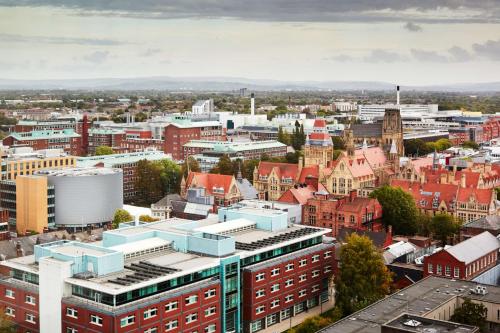 an aerial view of a city with buildings at Hyatt House Manchester - Aparthotel in Manchester