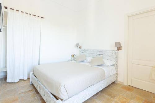 Letto o letti in una camera di Tenuta Pinto