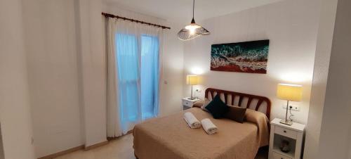 Posteľ alebo postele v izbe v ubytovaní Casa en el Rompido