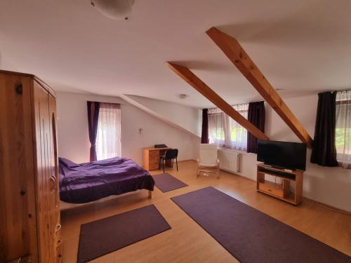 Posteľ alebo postele v izbe v ubytovaní Hungaria Apartments