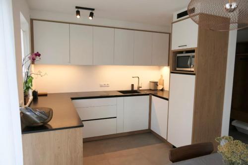 BioTop Appartement Kronplatzにあるキッチンまたは簡易キッチン