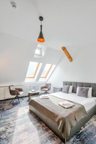 Ένα ή περισσότερα κρεβάτια σε δωμάτιο στο Residence Central Annapolis
