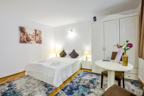 Ένα ή περισσότερα κρεβάτια σε δωμάτιο στο Residence Central Annapolis