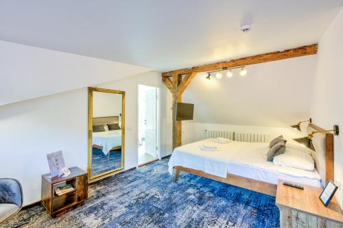 Ένα ή περισσότερα κρεβάτια σε δωμάτιο στο Residence Central Annapolis