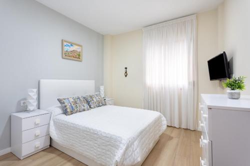 Ένα ή περισσότερα κρεβάτια σε δωμάτιο στο Home2Book Charming Apartment Puertito de Güímar