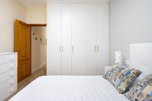 Ένα ή περισσότερα κρεβάτια σε δωμάτιο στο Home2Book Charming Apartment Puertito de Güímar