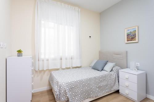 Ένα ή περισσότερα κρεβάτια σε δωμάτιο στο Home2Book Charming Apartment Puertito de Güímar