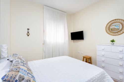 Ένα ή περισσότερα κρεβάτια σε δωμάτιο στο Home2Book Charming Apartment Puertito de Güímar