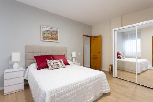 Säng eller sängar i ett rum på Home2Book Charming Apartment Puertito de Güímar