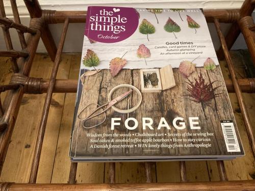 a magazine on top of a wooden table at Heathpark House in Blairgowrie