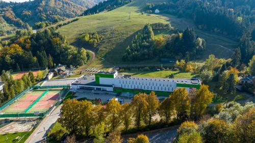an aerial view of a building in the mountains at Ryterski in Rytro