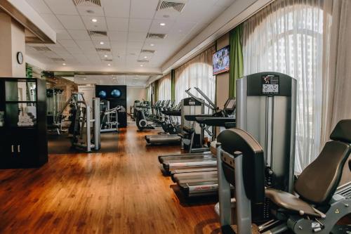 a gym with many treadmills and cardio machines at InterContinental Grand Ho Tram in Ho Tram