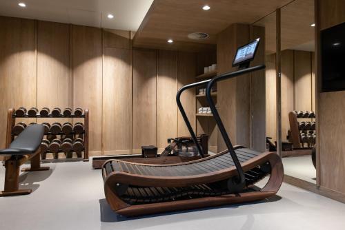 a room with a gym with a treadmill at Pillows Grand Boutique Hotel Maurits at the Park - Small Luxury Hotels in Amsterdam