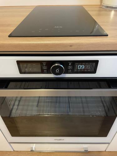 a toaster oven sitting on top of a counter at Keskuse apartment with a balcony in Haapsalu