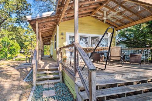 a porch of a house with a swing at Lovely Toledo Bend Studio with Scenic Views! in Many