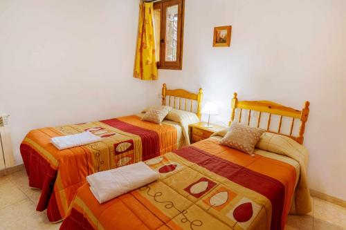 Postel nebo postele na pokoji v ubytování Casa Xaupí Gran