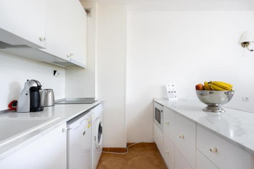 A kitchen or kitchenette at Seafront studio with beach view in the center of Los Cristianos