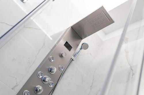 a close up of a shower in a bathroom at Prezioso suites & rooms in Lecce
