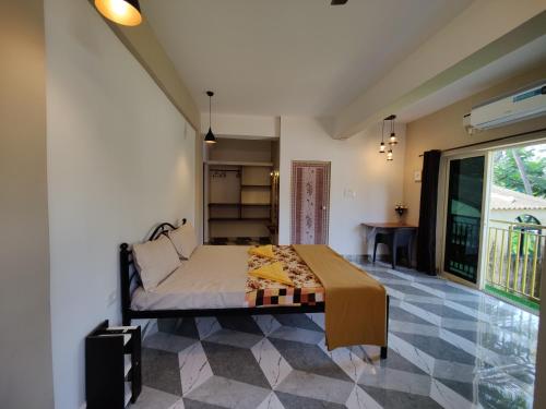 Postel nebo postele na pokoji v ubytování Rosean Homestay Self Service Apartments
