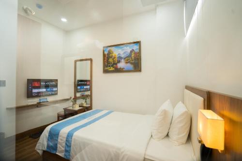 Santini Hotelにあるベッド