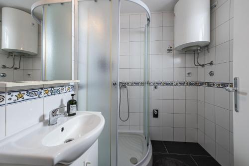 Kúpeľňa v ubytovaní Apartments Small pleasure