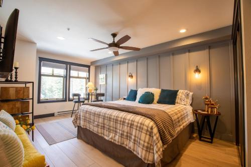a bedroom with a bed and a ceiling fan at 1303 - Two Bedroom Deluxe Eagle Springs West condo in Solitude