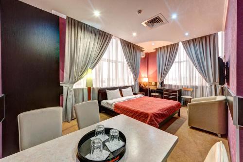 Ένα ή περισσότερα κρεβάτια σε δωμάτιο στο Terra Nova Sport&Spa Hotel