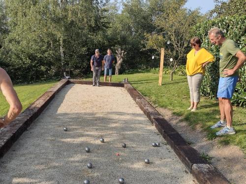 a group of people playing a game of balls at Votre Horizon in Aywaille