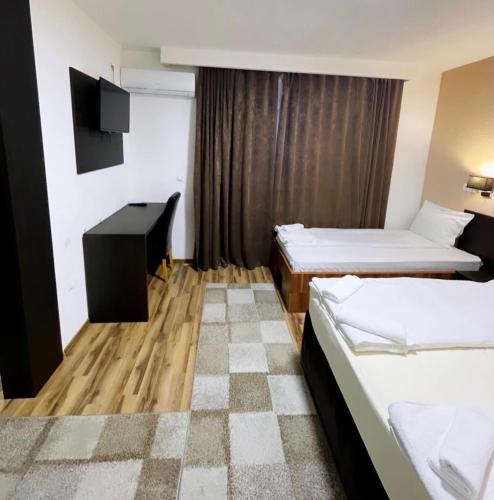 Postel nebo postele na pokoji v ubytování Hotel Casablanca