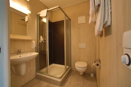 A bathroom at Best sleep Hotel