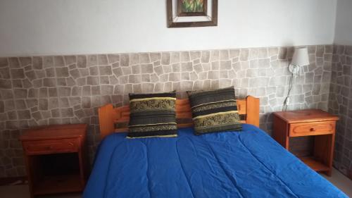 Postel nebo postele na pokoji v ubytování Complejo AleMar